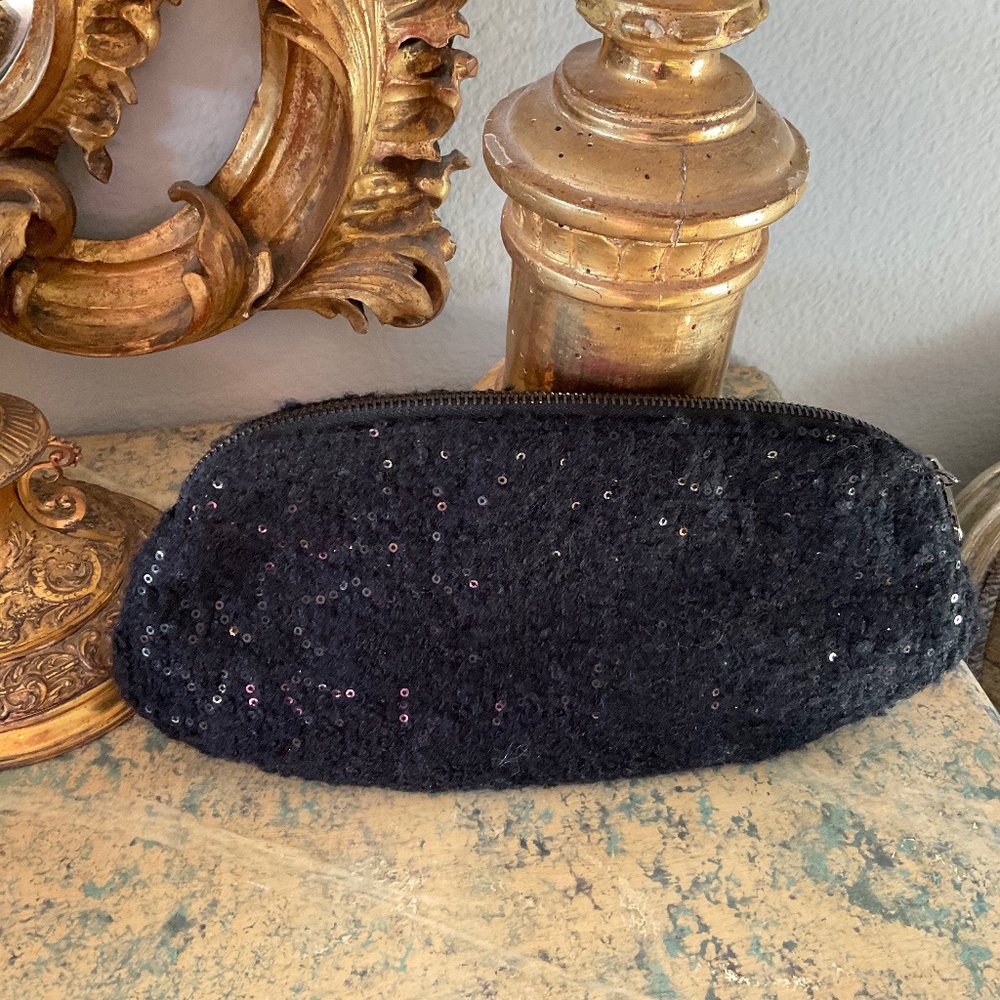 Black metallic fabric clutch by Deux Lux